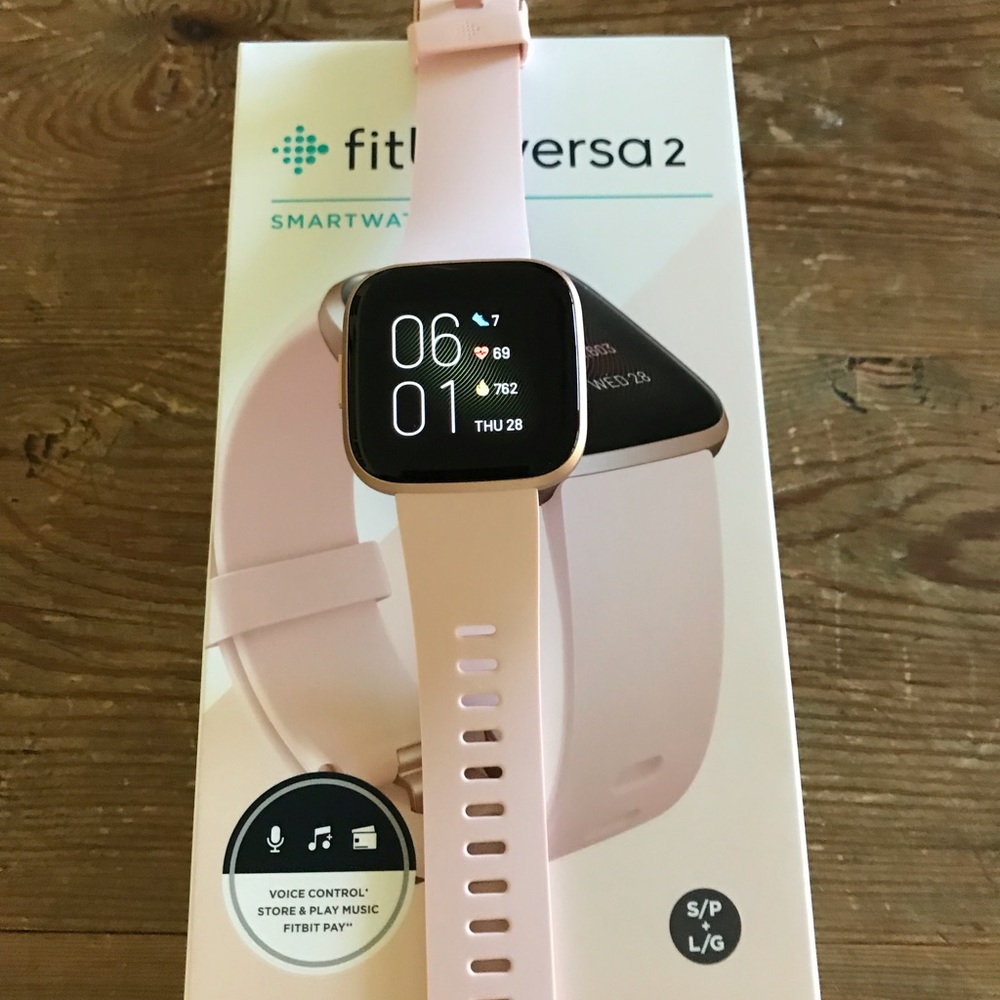 Fitbit Versa 2.  New, never worn.  Purchased 7/13 for $119.  2 bands, charger
